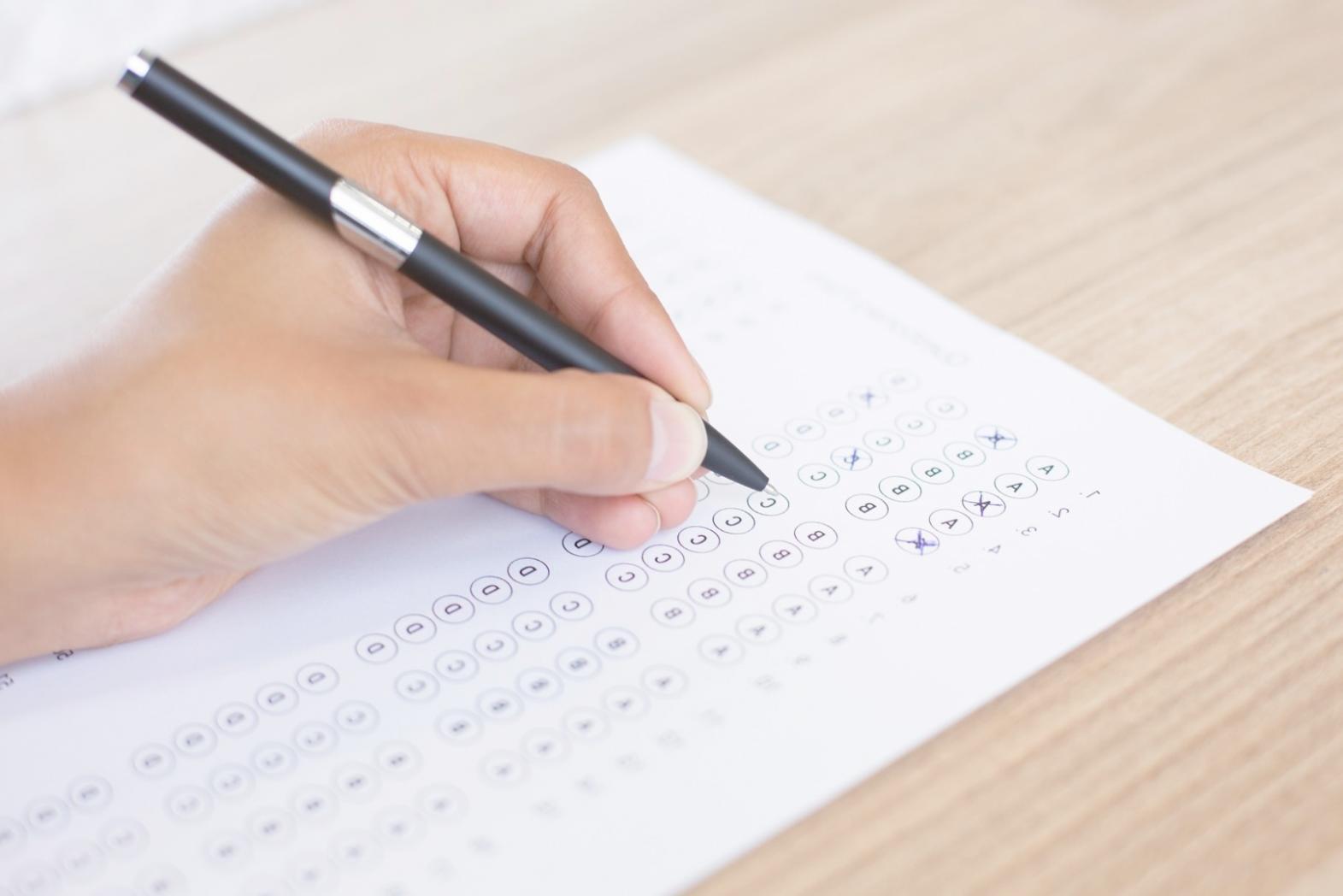 Trader analyzing multiple technical indicators on screen