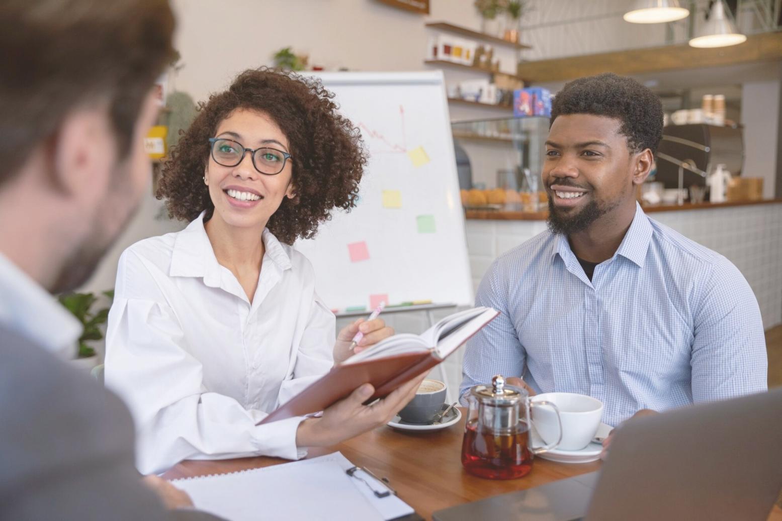 Trading analysis workstation setup showing multiple monitors with charts and technical indicators