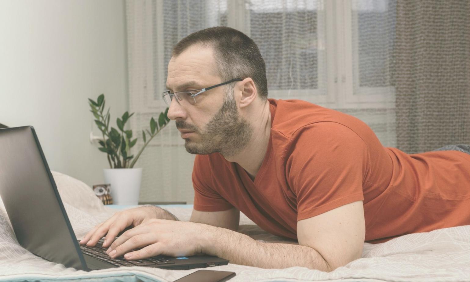 Student reviewing technical analysis setup with multiple chart timeframes